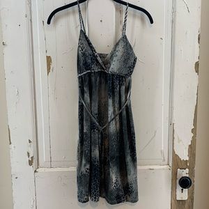 B. Split Reptile Print Sleeveless Tunic